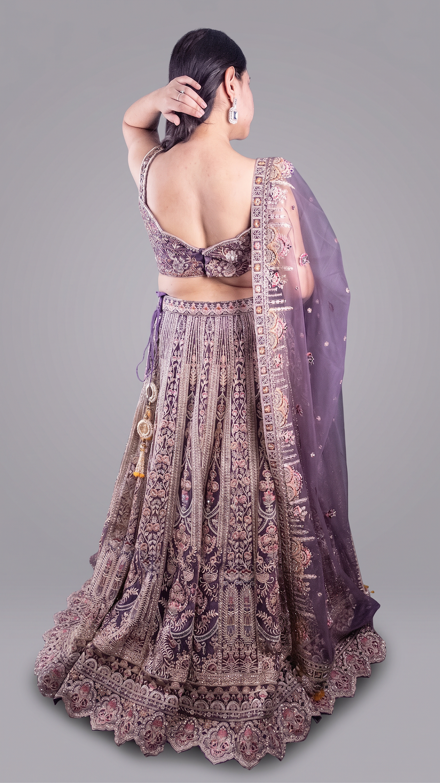 Mauve Net Lehenga With Zari and Floral Embroidery — back view