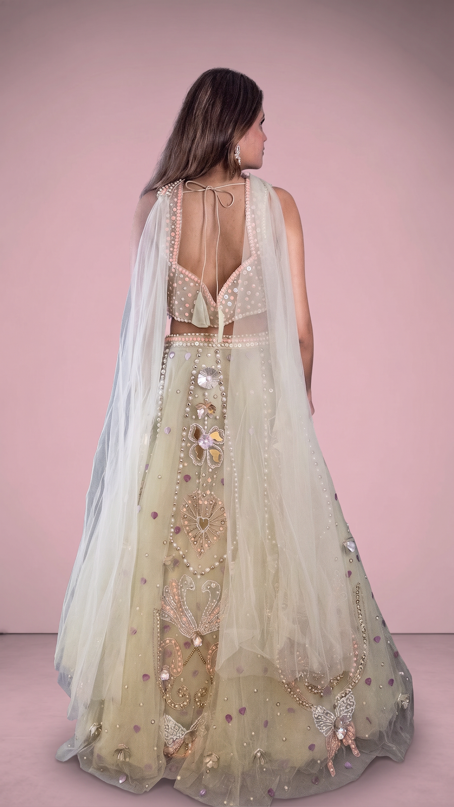 Pista Green Net Lehenga With Pearl and Shell Work — back view