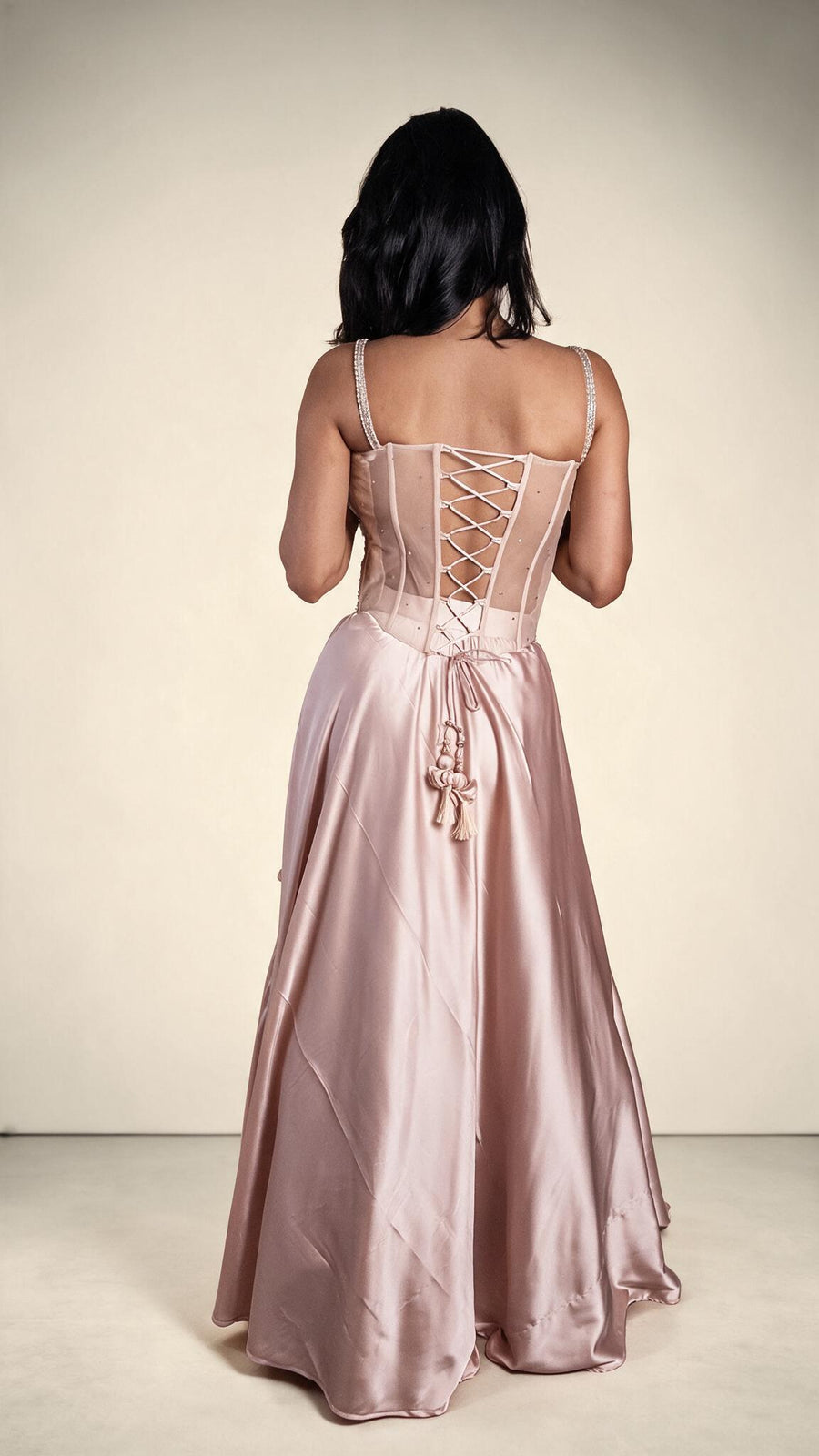 Light Pink Satin Corset Lehenga With Cutdana Bodice — back view