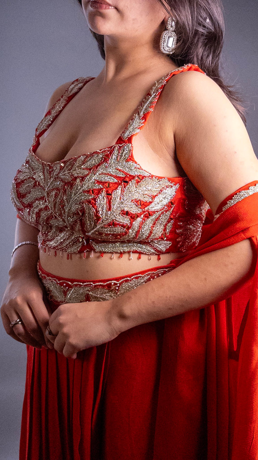 Orange Crepe Skirt Set With Zari Bustier and Cape — dupatta detail