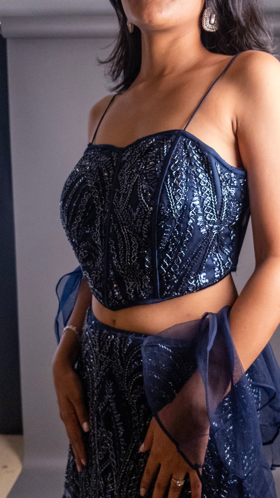 Navy Sequin Corset Lehenga With Organza Drape — styling detail