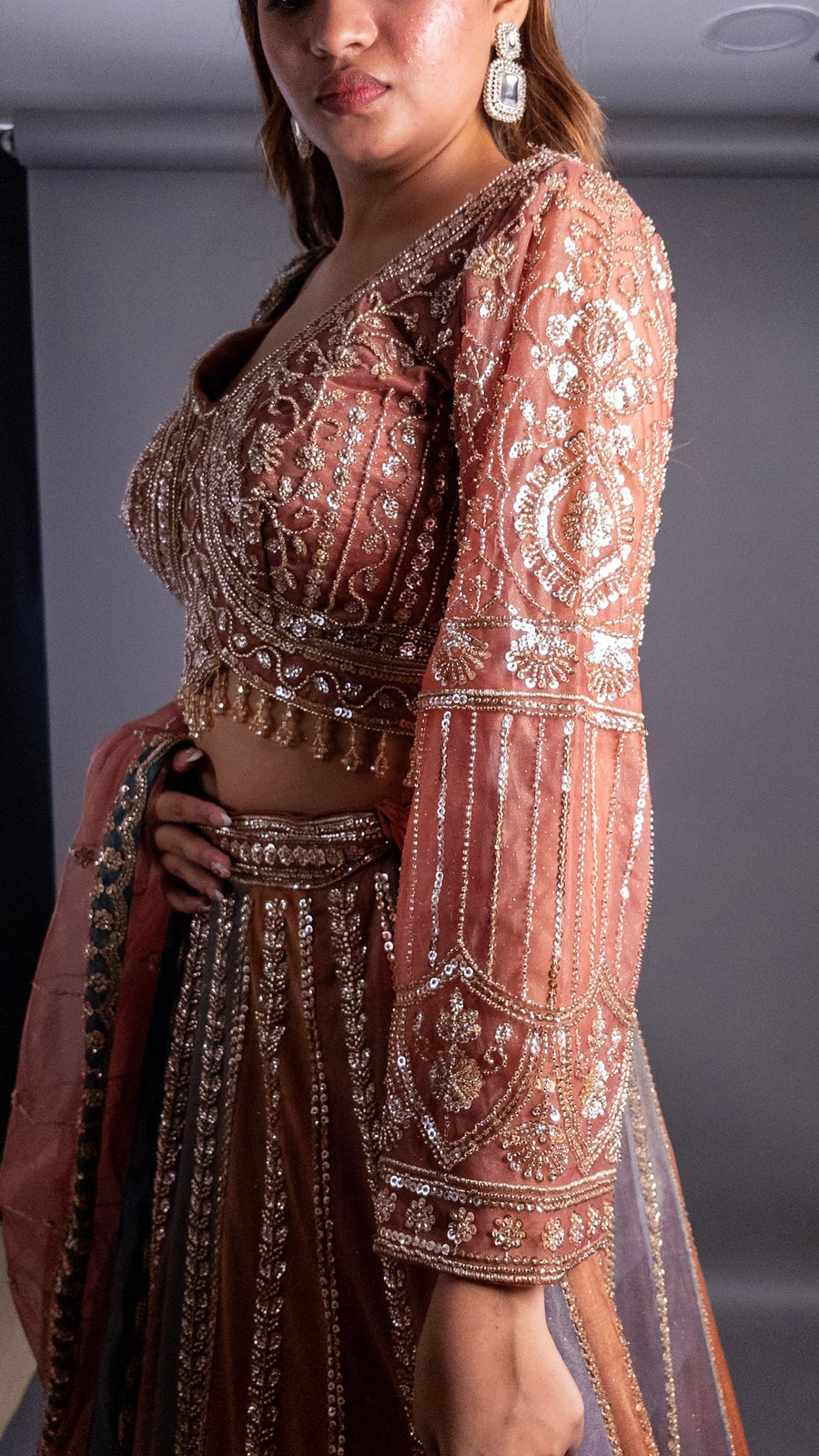 Rust Net Kali Lehenga With Zari and Sequin Work — styling detail