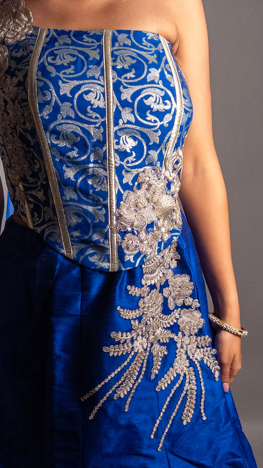 Royal Blue Raw Silk Lehenga With Zari Corset Blouse — styling detail