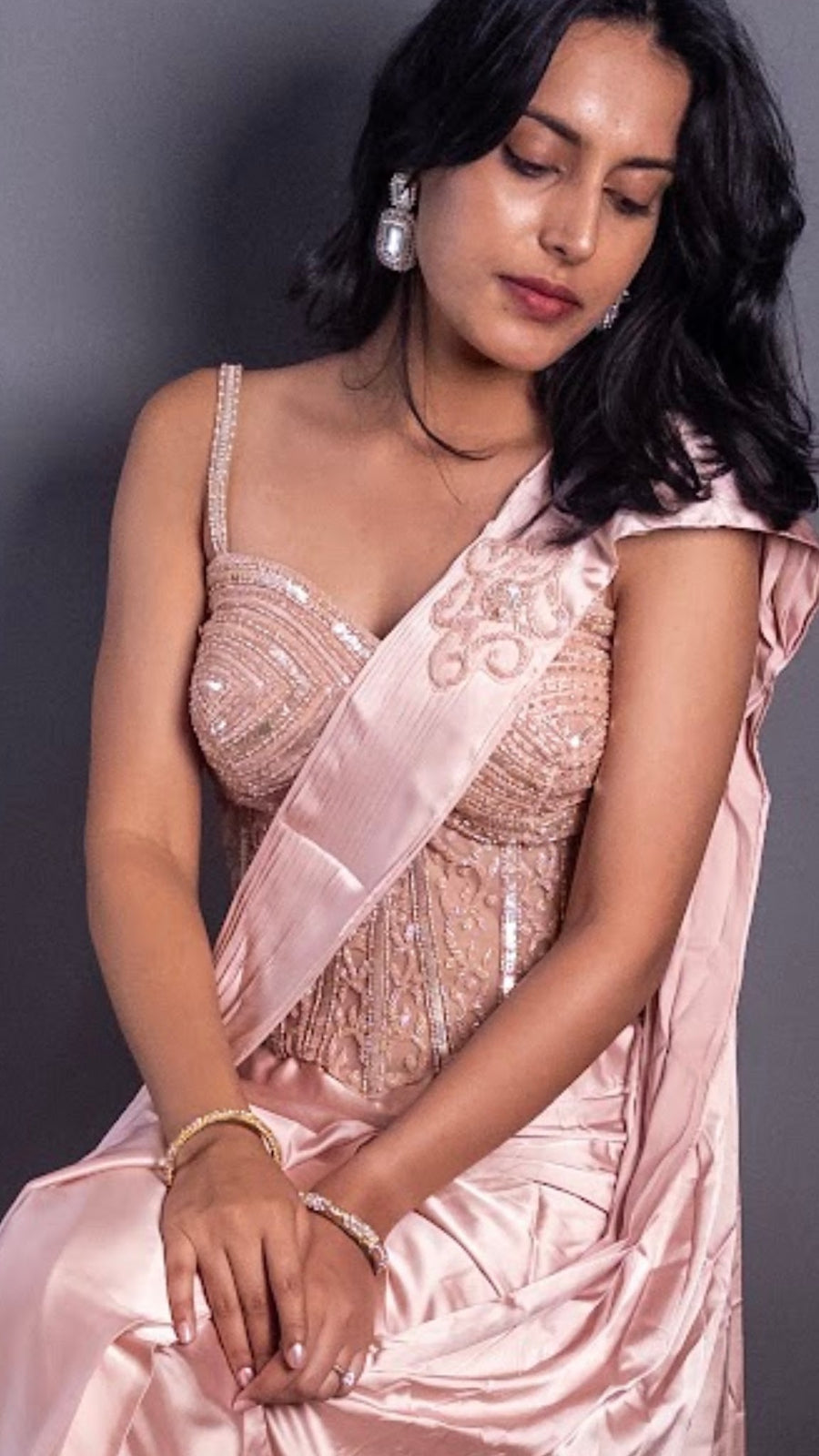 Peach Satin Pre-Draped Saree With Corset Blouse — styling detail
