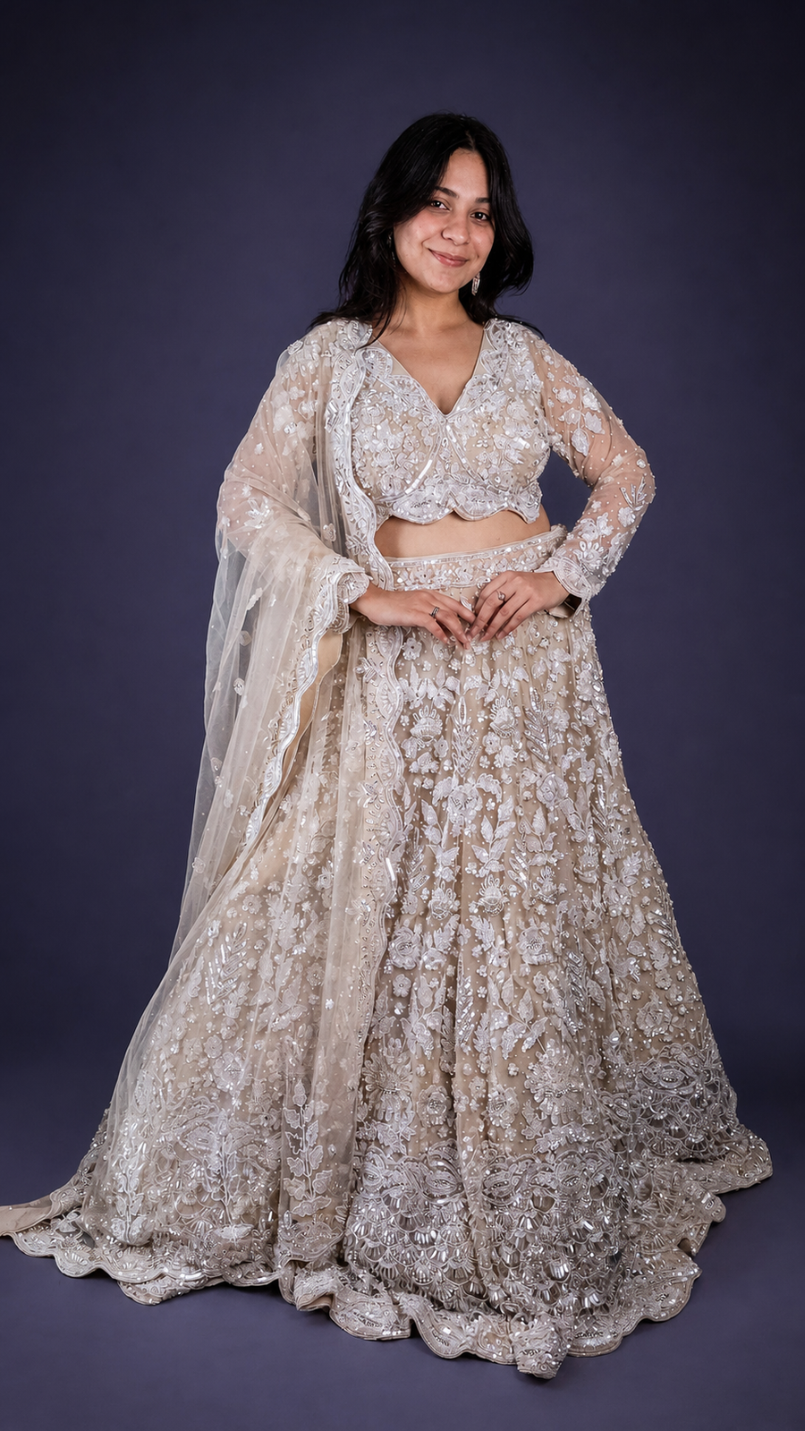Ivory Net Flared Lehenga With Zari and Cutdana Florals — front view