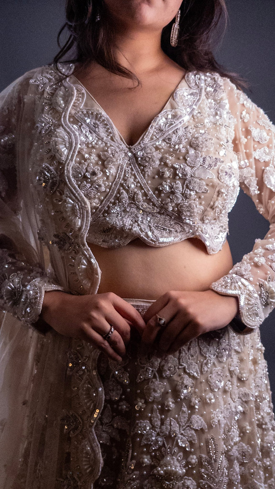 Ivory Net Flared Lehenga With Zari and Cutdana Florals — blouse detail