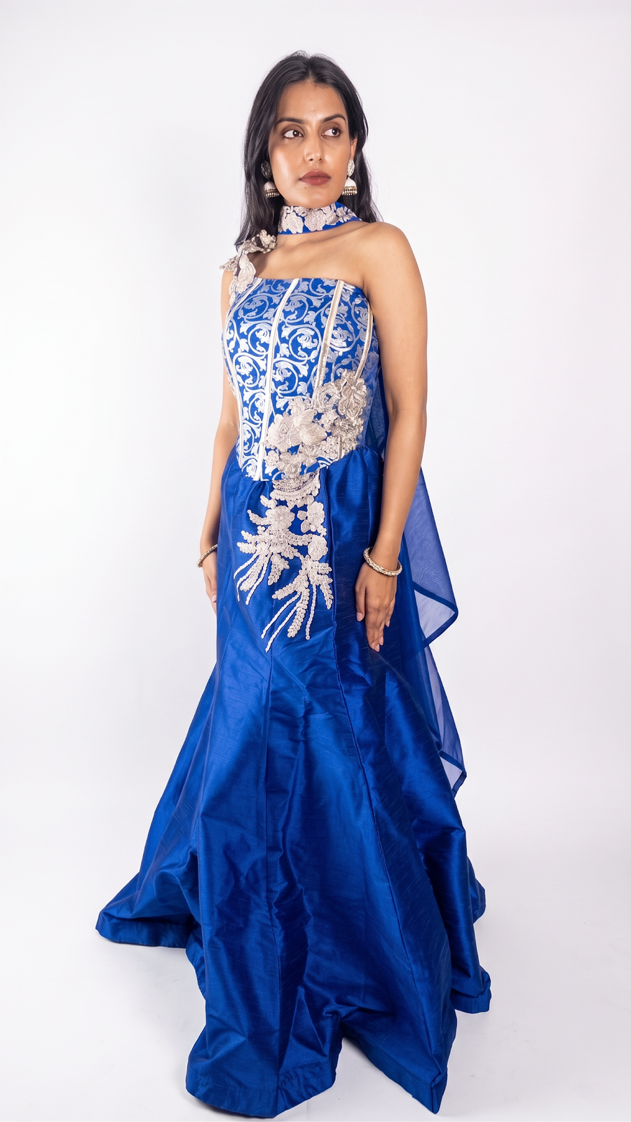 Royal Blue Raw Silk Lehenga With Zari Corset Blouse — back view