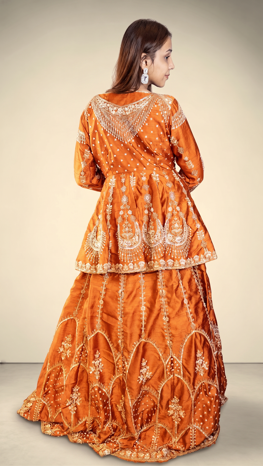 Rust Orange Raw Silk Peplum Jacket Lehenga Set — back view