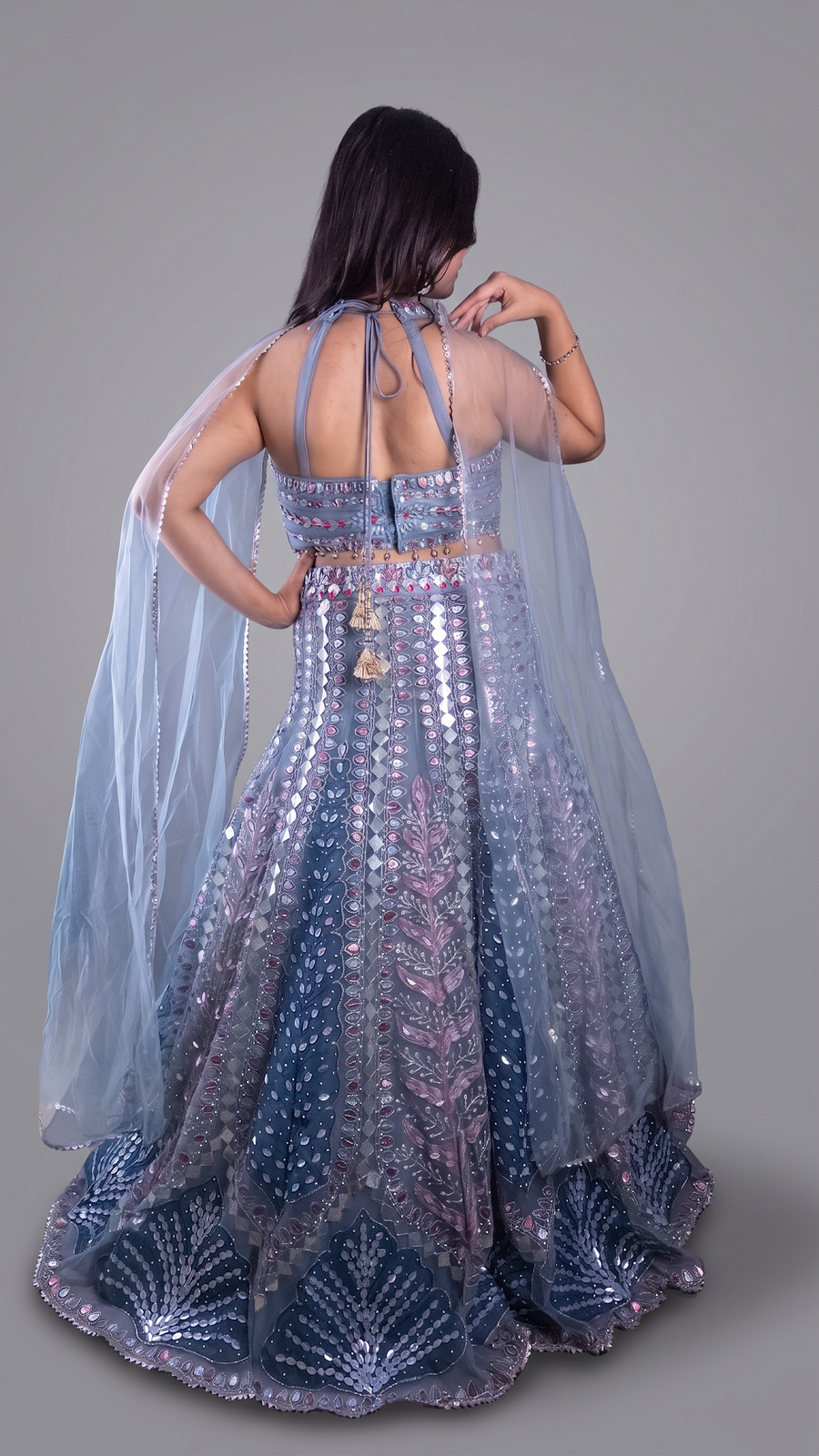 Ice Blue Net Halter Lehenga With Mirror and Zari Work — back view