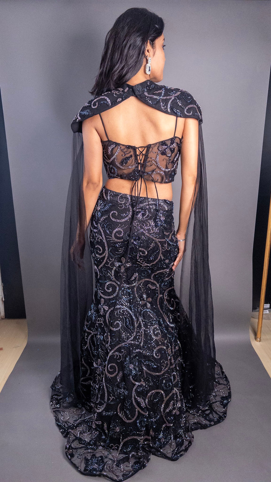 Black Net Mermaid Lehenga With Cape — back view