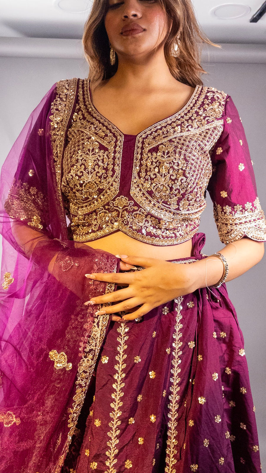 Wine Raw Silk Flared Lehenga With Cutdana Work — dupatta detail
