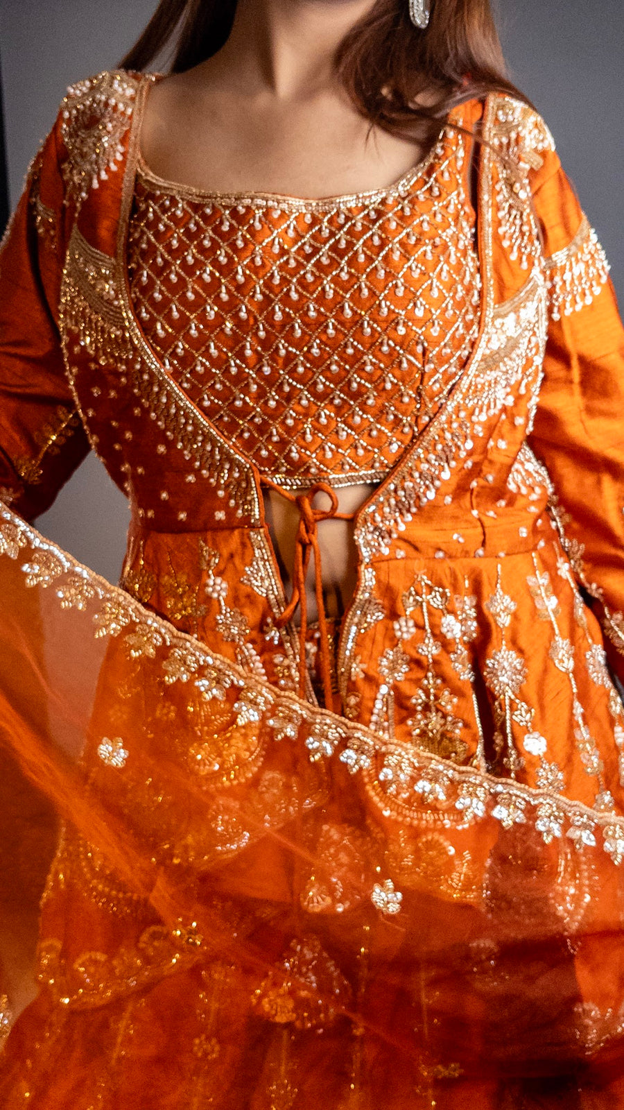 Rust Orange Raw Silk Peplum Jacket Lehenga Set — dupatta detail
