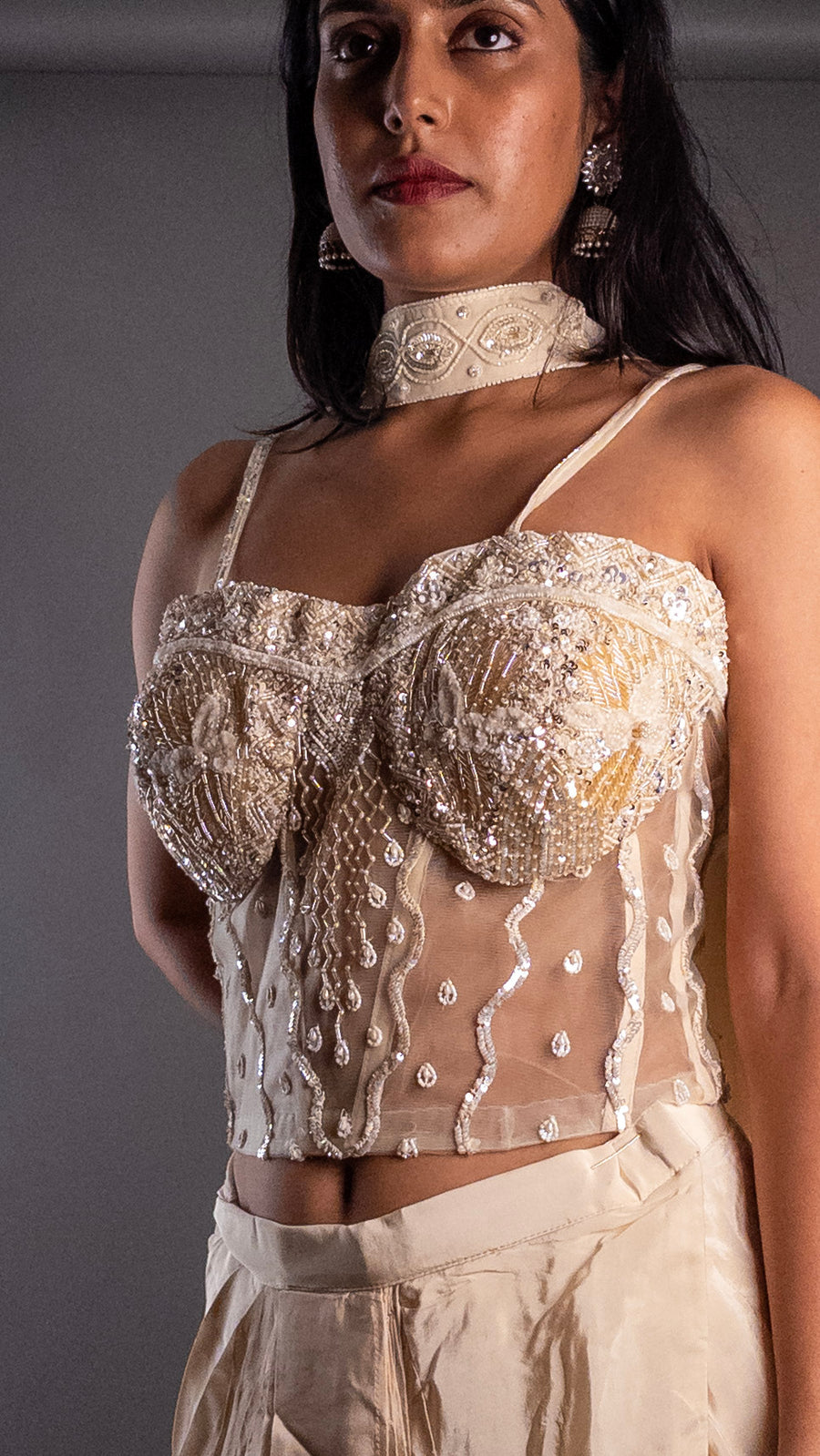 White Crepe Corset Blouse and Pleated Skirt Set — styling detail