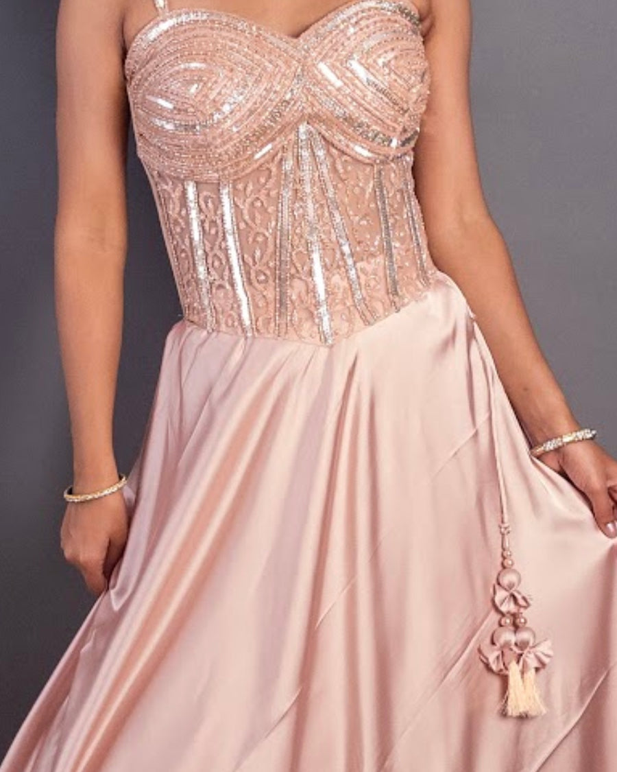 Light Pink Satin Corset Lehenga With Cutdana Bodice — styling detail