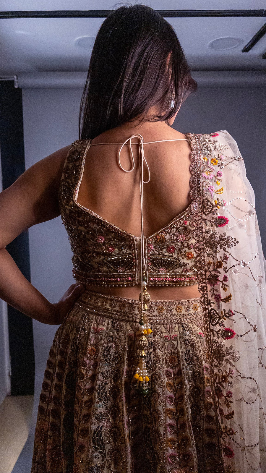 Off-White Shimmer Silk Kali Lehenga With Zari Thread Work — styling detail