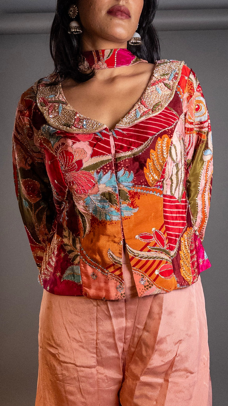 Peach Satin Palazzo Set With Embroidered Choker Jacket — styling detail