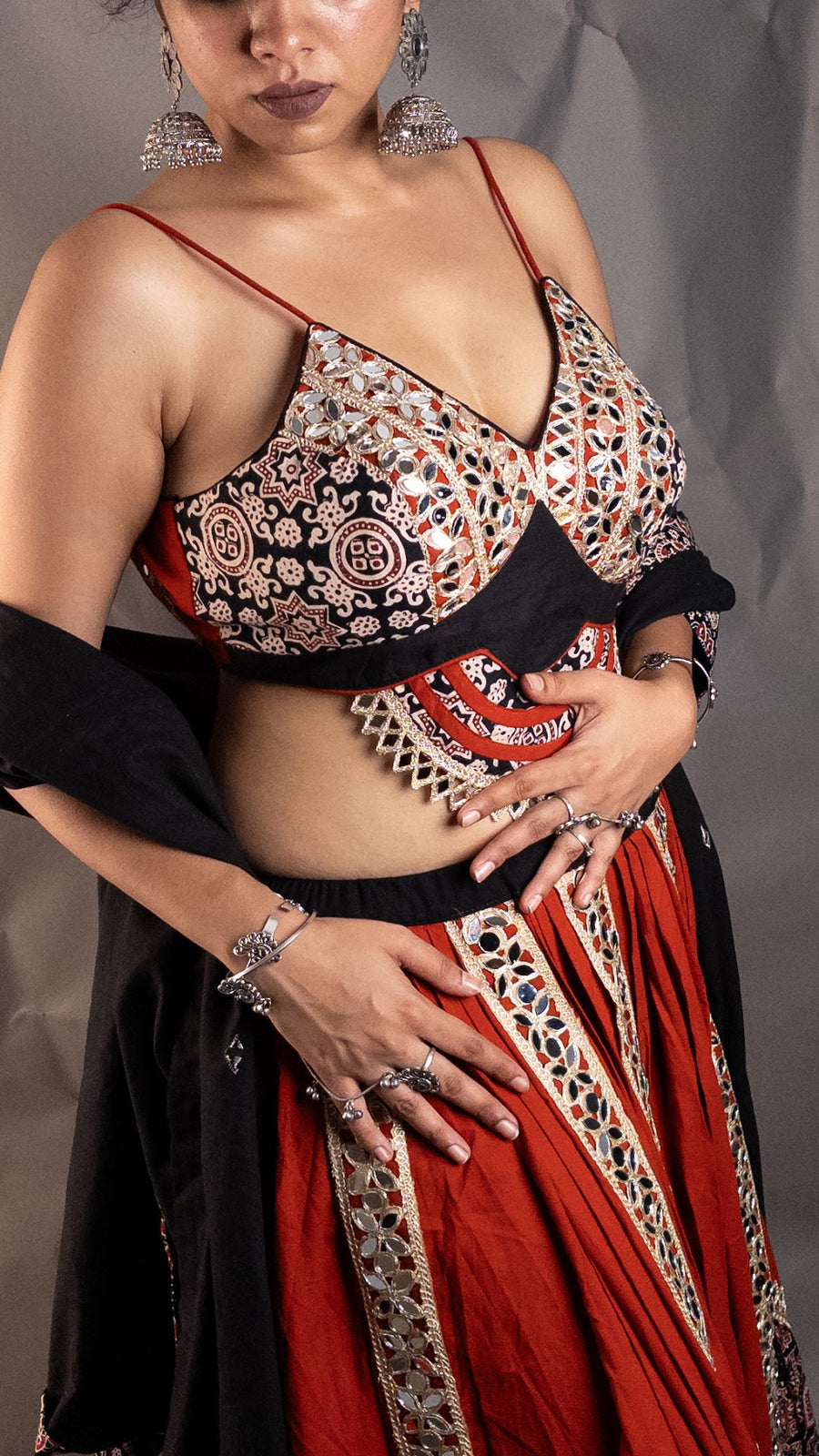 Rust Cotton Flared Kali Lehenga With Mirror Work — styling detail
