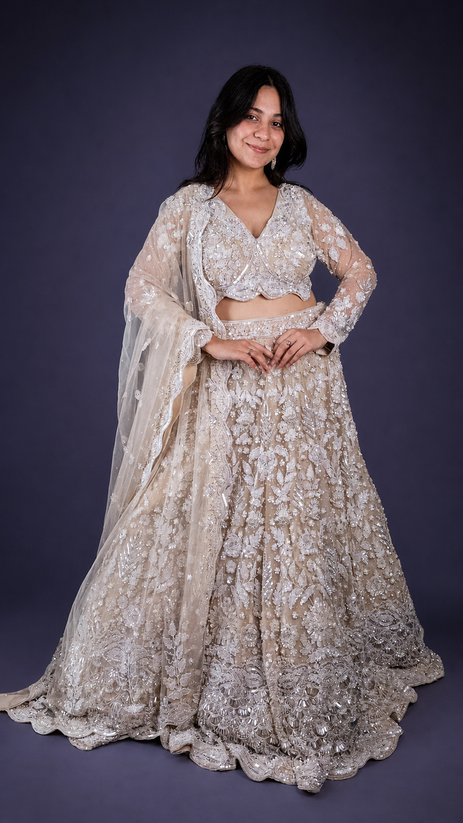 Ivory Net Flared Lehenga With Zari and Cutdana Florals