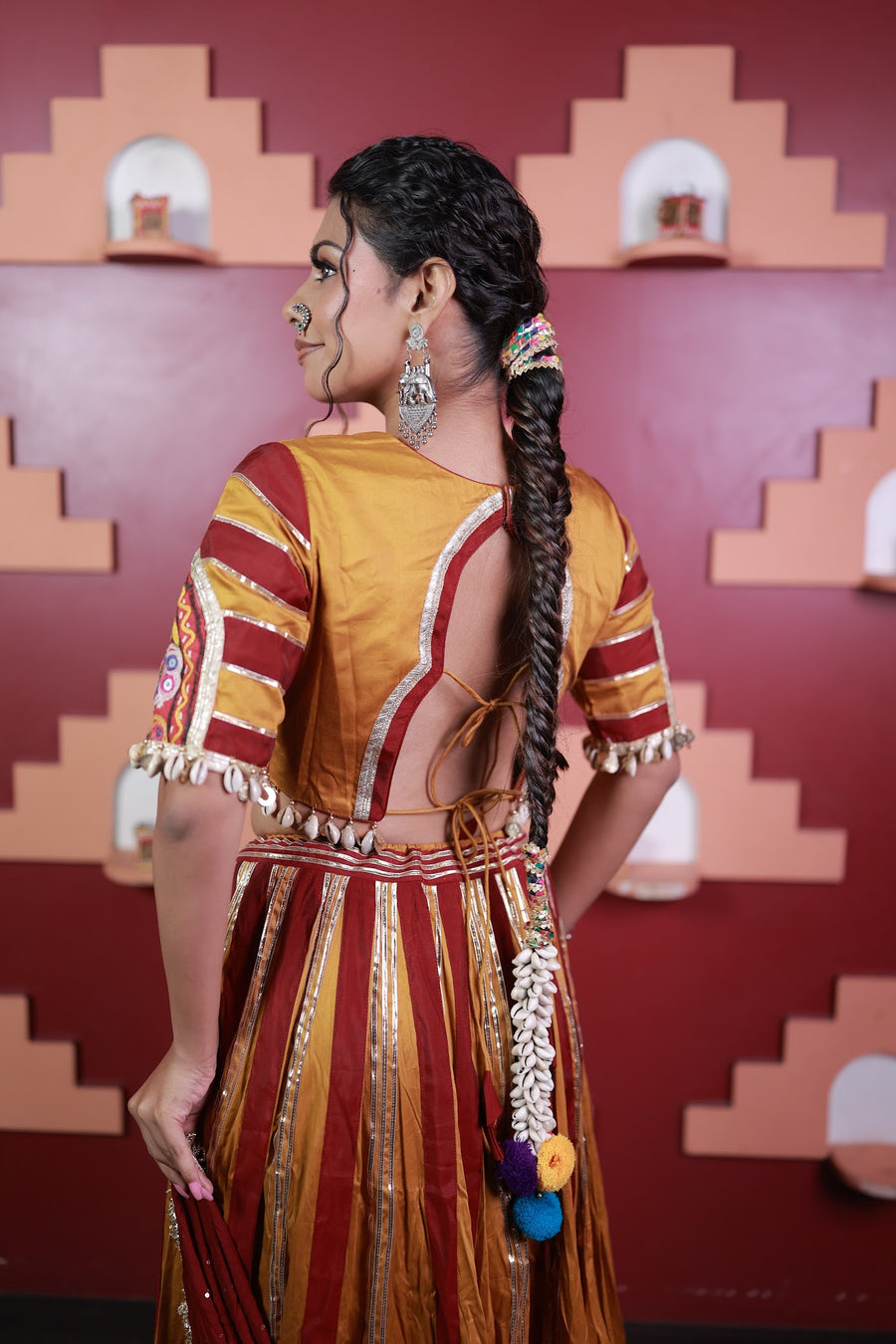 Mustard and Red Cotton Kali Lehenga With Shell Trims — fabric detail