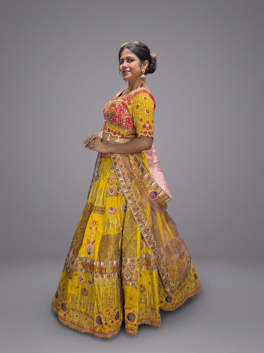Yellow Silk Flared Kali Lehenga With Mirror Work — fabric detail