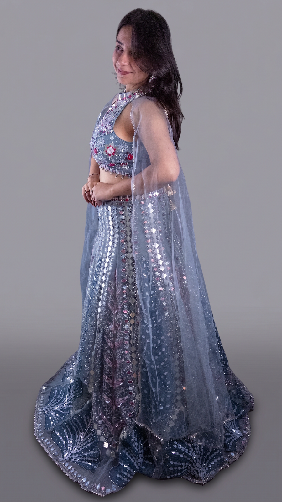 Ice Blue Net Halter Lehenga With Mirror and Zari Work — fabric detail