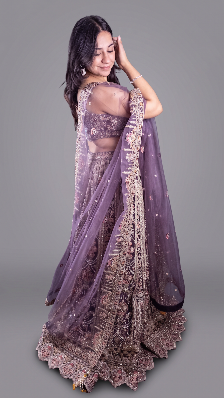 Mauve Net Lehenga With Zari and Floral Embroidery — fabric detail