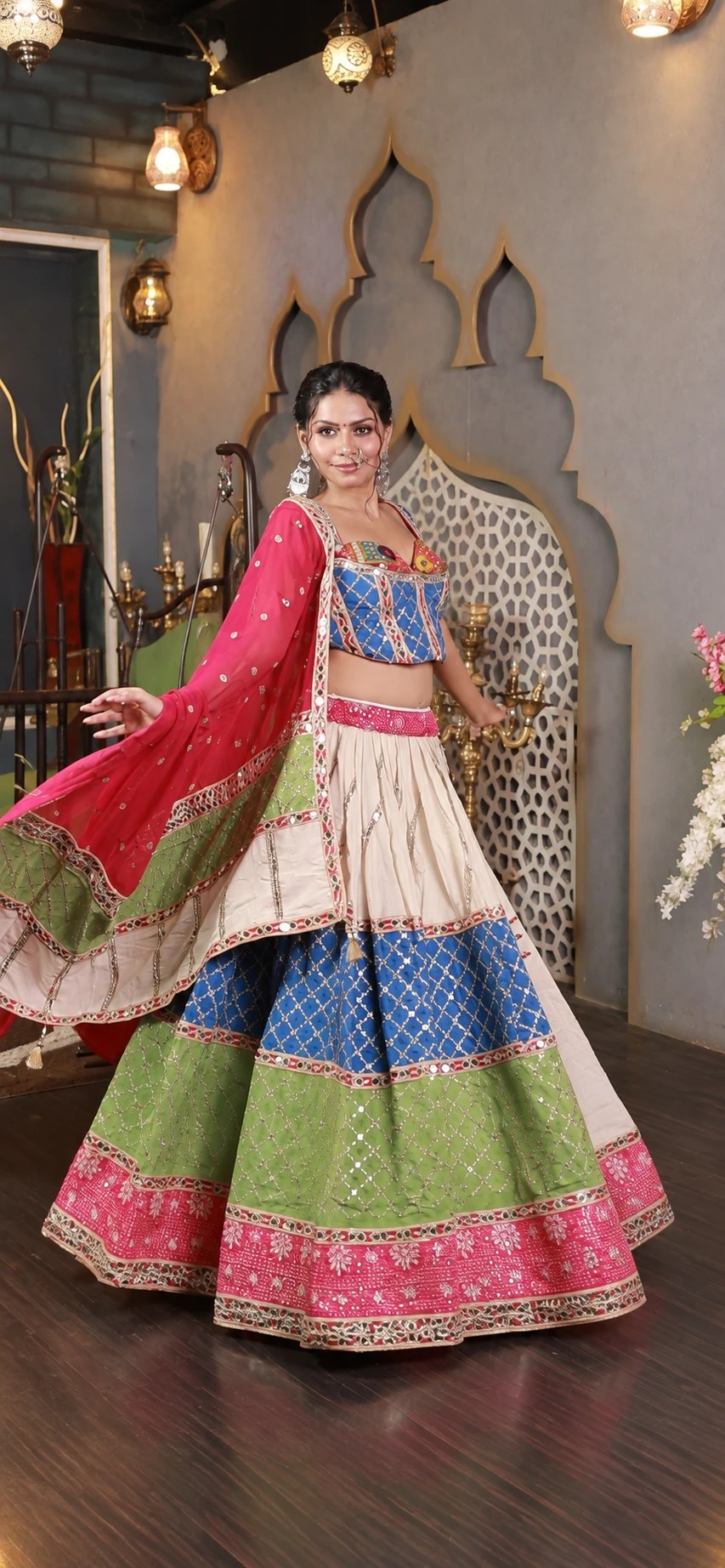 A mirror-work kali lehenga mid-twirl, from the Navratri edit